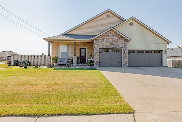 view of front facade featuring a front yard and a garage