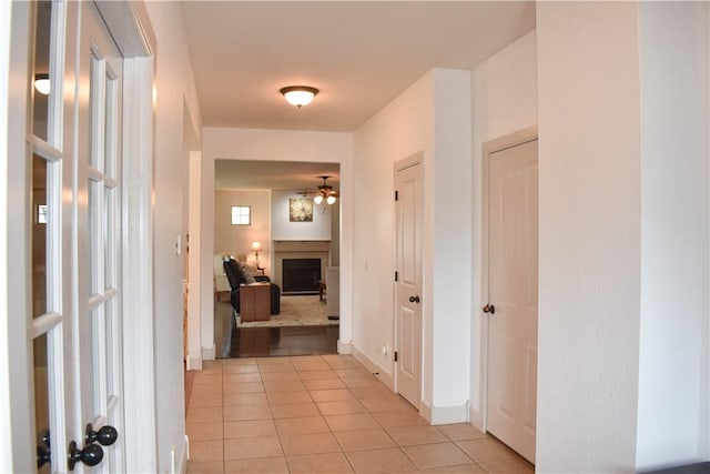 2111 Hunter Dr, Pea Ridge, AR 72751 - hall with baseboards and light tile patterned floors