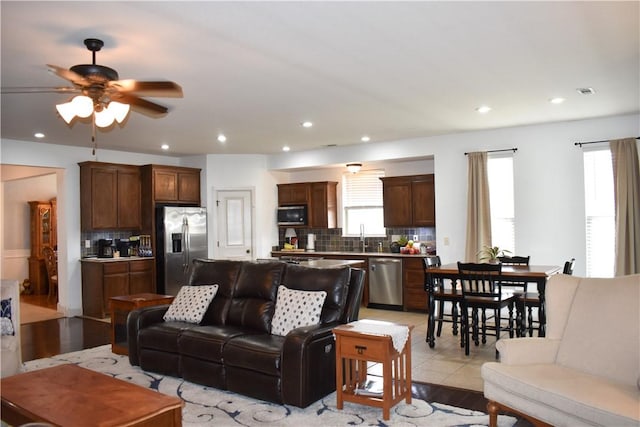 2111 Hunter Dr, Pea Ridge, AR 72751 - living room with visible vents, a ceiling fan, light wood-style flooring, and recessed lighting