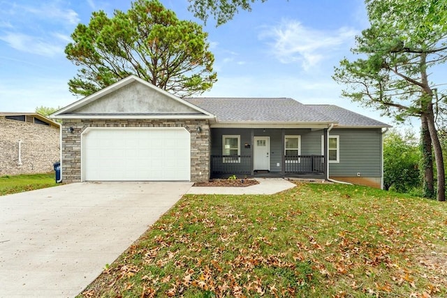 ranch-style home with an attached garage, a porch, concrete driveway, a front lawn, and roof with shingles