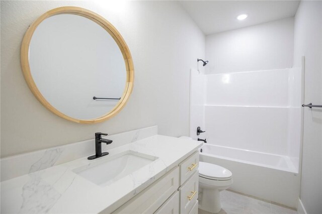 full bathroom featuring tile patterned flooring, vanity,  shower combination, and toilet