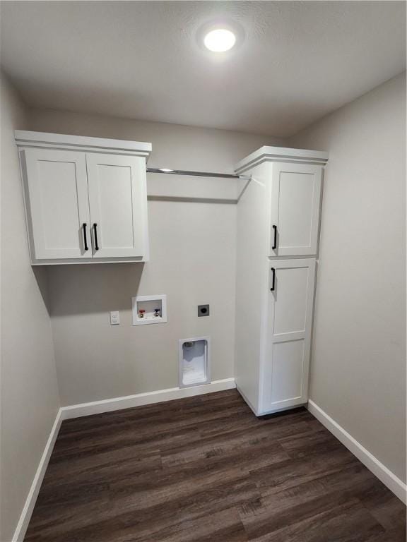 laundry room with dark wood-type flooring, washer hookup, electric dryer hookup, and baseboards
