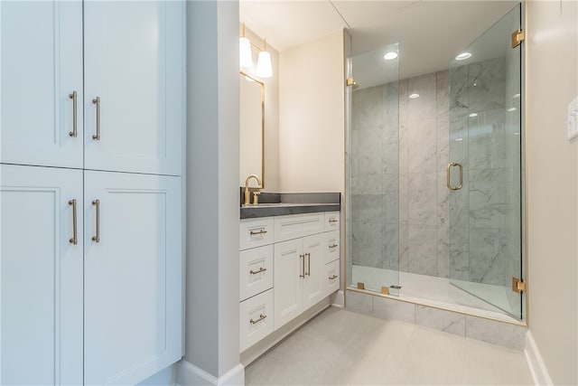 bathroom with vanity and an enclosed shower