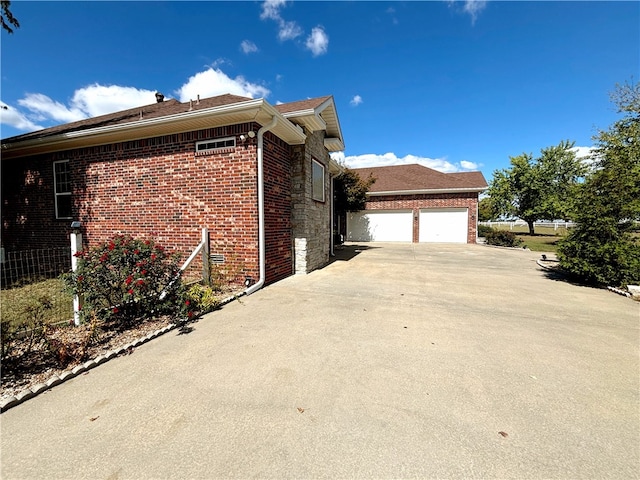 view of property exterior with a garage