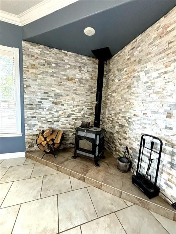 8825 Sky Watch Ln, Decatur, AR 72722 - detailed view of a wood stove, crown molding, and baseboards