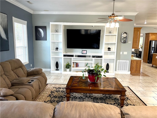 living room with crown molding, light tile patterned flooring, and ceiling fan