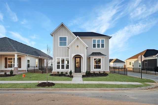 view of front facade with a front yard