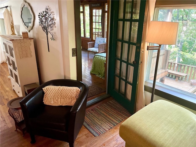 doorway to outside featuring hardwood / wood-style flooring and a wealth of natural light