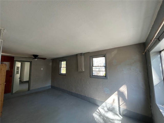 interior space featuring ceiling fan