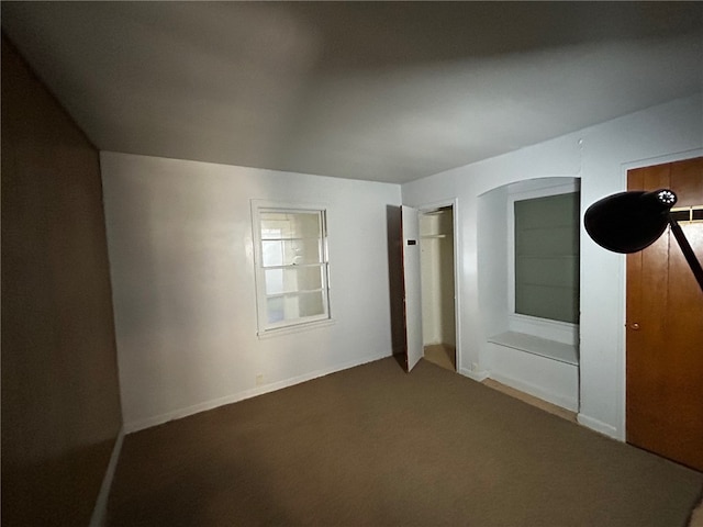 unfurnished bedroom featuring carpet flooring