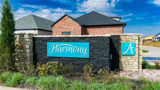 view of community sign