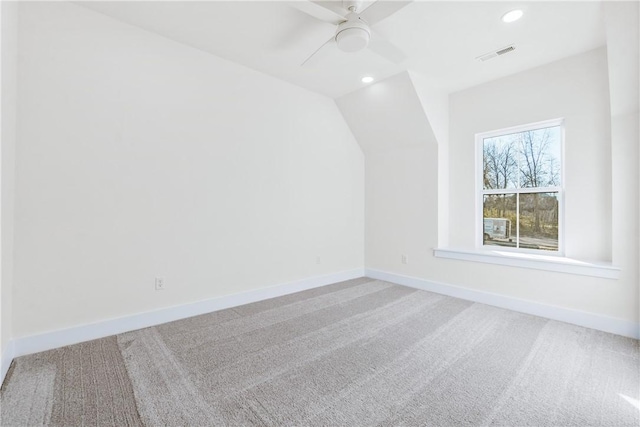 bonus room featuring vaulted ceiling, visible vents, recessed lighting, a ceiling fan, and carpet floors
