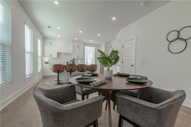 dining room featuring light wood-type flooring