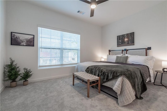 427 E Martin Luther King Jr Blvd, Fayetteville, AR 72701 - bedroom featuring light colored carpet and a ceiling fan