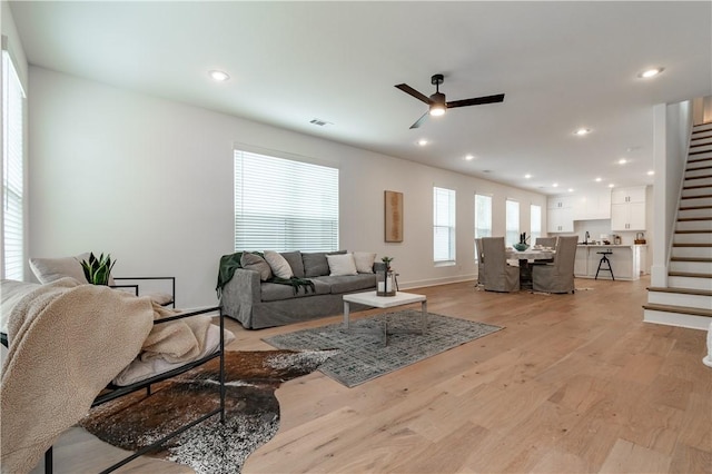 427 E Martin Luther King Jr Blvd, Fayetteville, AR 72701 - living area featuring a ceiling fan, stairs, light wood-type flooring, and recessed lighting
