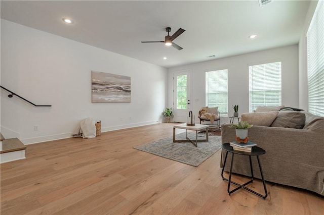 427 E Martin Luther King Jr Blvd, Fayetteville, AR 72701 - living area featuring light wood-type flooring, a ceiling fan, stairway, and recessed lighting