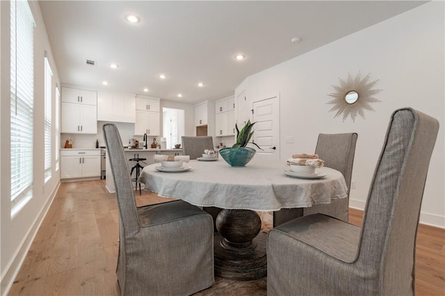 427 E Martin Luther King Jr Blvd, Fayetteville, AR 72701 - dining area with recessed lighting and light wood-style floors