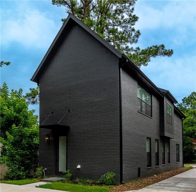 427 E Martin Luther King Jr Blvd, Fayetteville, AR 72701 - view of home's exterior with brick siding