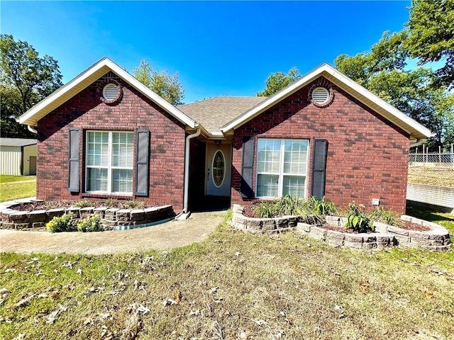 view of front of home with a front yard