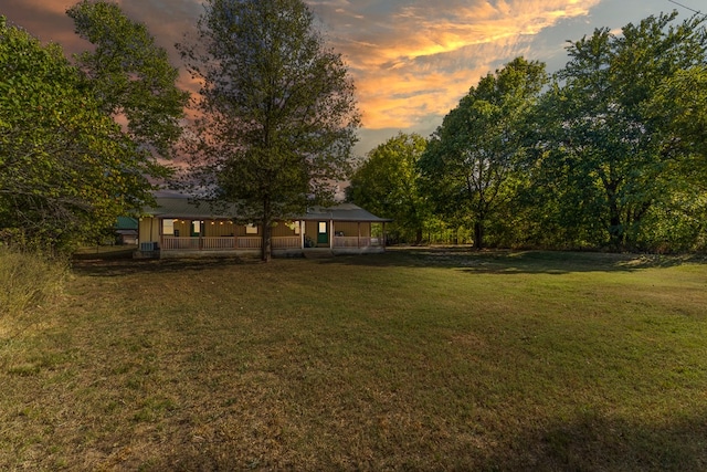 yard at dusk with a porch