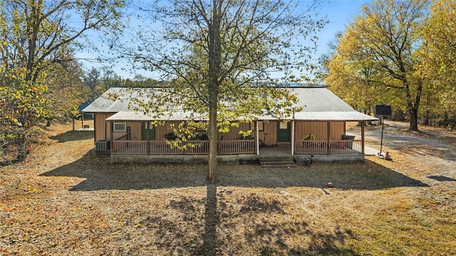 exterior space featuring covered porch and central AC unit