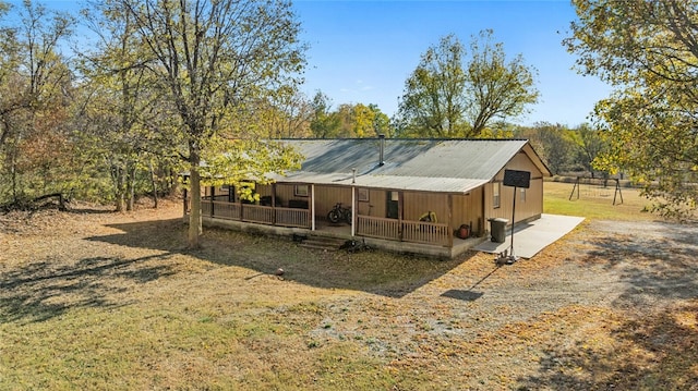 exterior space featuring covered porch