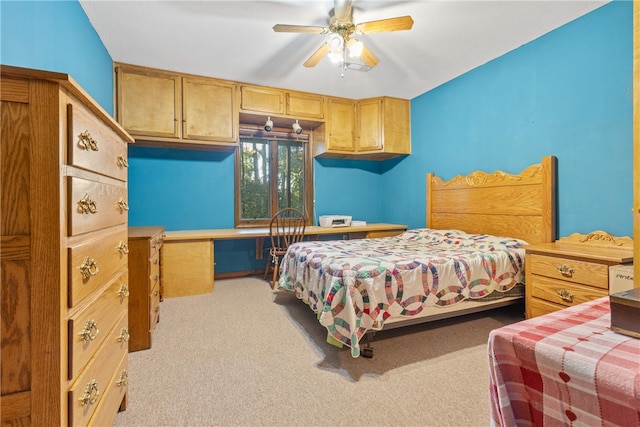 bedroom with light colored carpet and ceiling fan