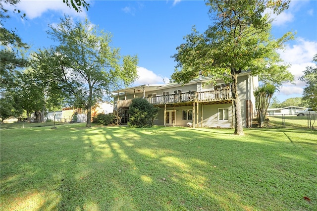 view of yard with a wooden deck