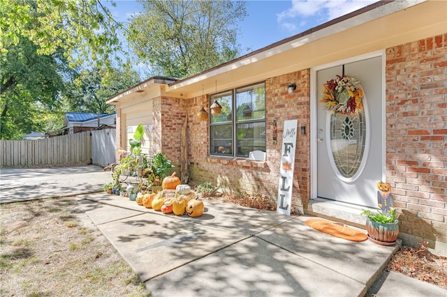 doorway to property featuring a patio