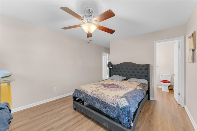 bedroom featuring light hardwood / wood-style floors and ceiling fan