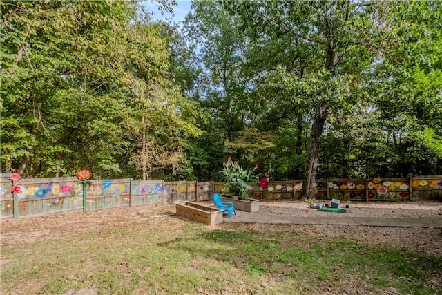 view of play area featuring a lawn