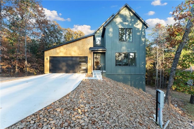 view of front of property featuring driveway and a garage