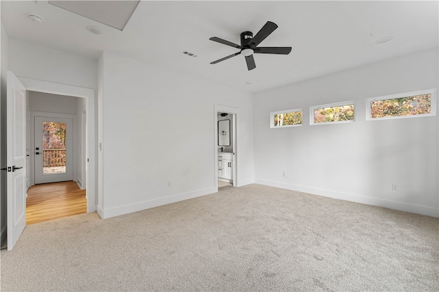 unfurnished room with light carpet and ceiling fan