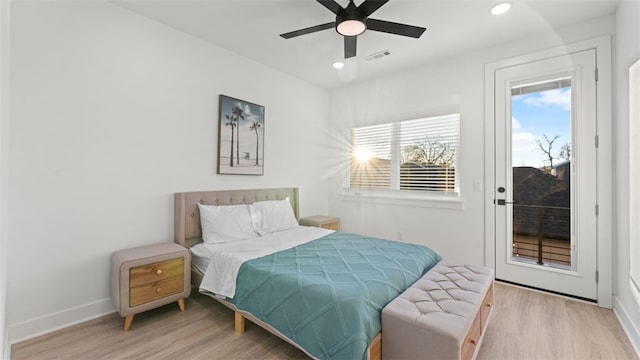 bedroom featuring light wood-type flooring, ceiling fan, and access to exterior