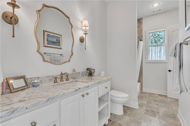 full bathroom with vanity, shower / bath combination with curtain, and toilet