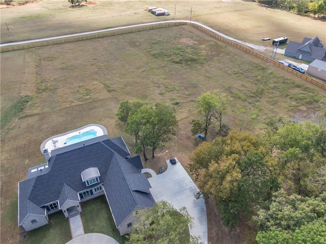 birds eye view of property featuring a rural view