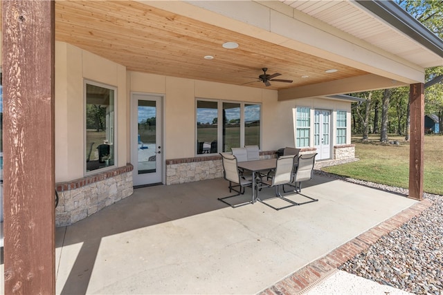 view of patio / terrace with ceiling fan and french doors