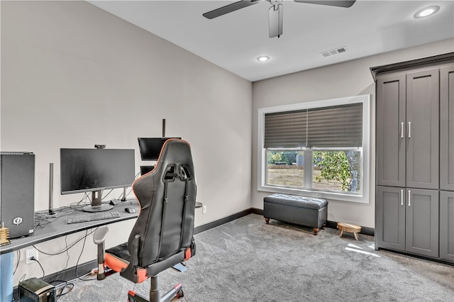 office area with ceiling fan and light colored carpet