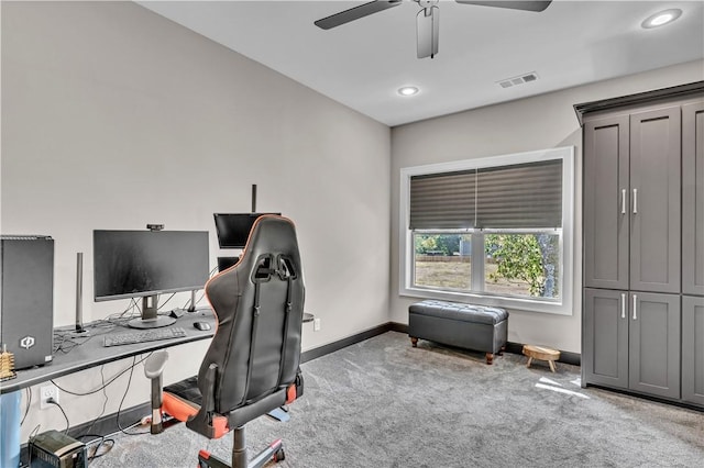 carpeted office space with recessed lighting, visible vents, baseboards, and a ceiling fan