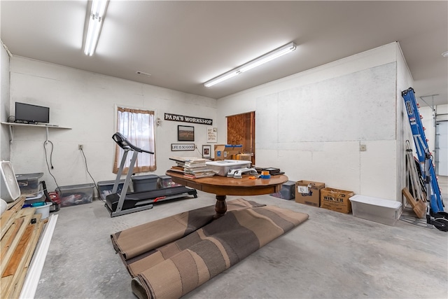 workout area with concrete floors