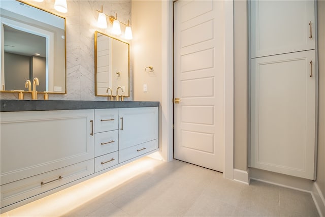 bathroom featuring vanity and tile patterned flooring