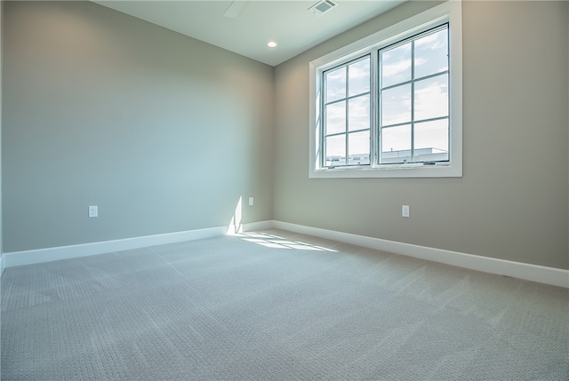 unfurnished room with carpet floors