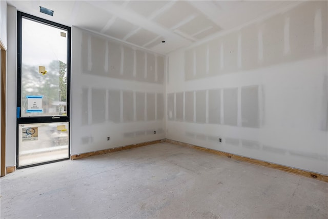 empty room featuring expansive windows