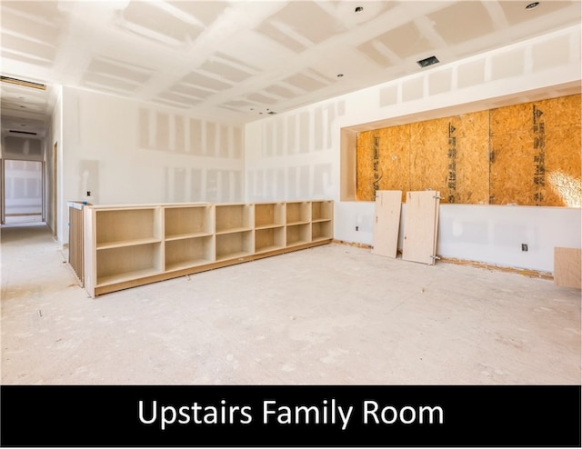 spare room featuring concrete floors