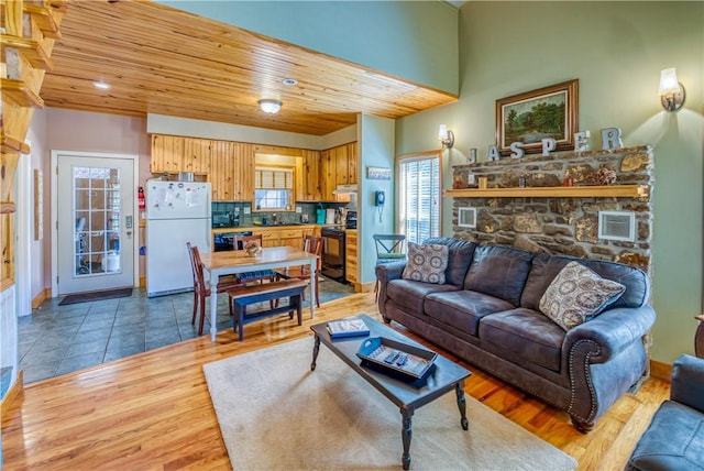 living room with wood ceiling and wood-type flooring