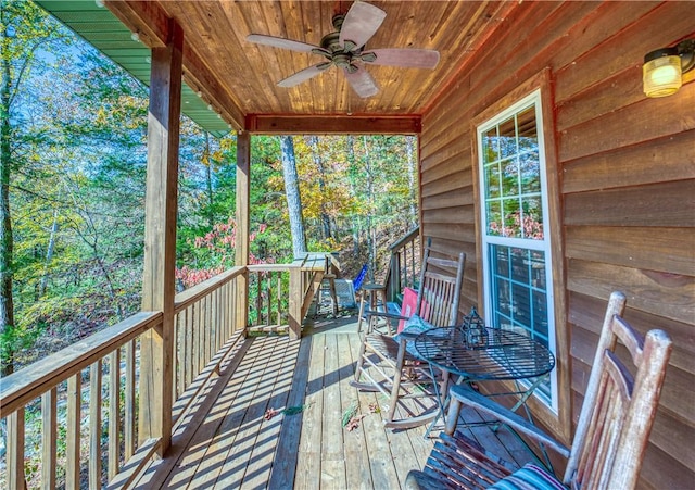 wooden deck with ceiling fan