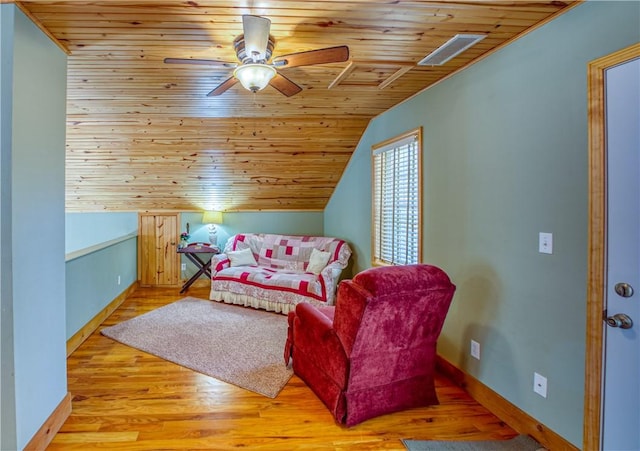 living area featuring lofted ceiling, ceiling fan, wood ceiling, and light hardwood / wood-style flooring