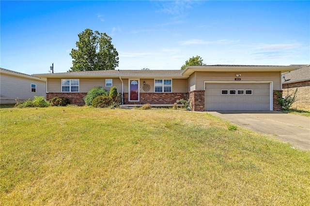 ranch-style house with a garage and a front lawn