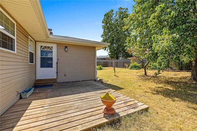 deck featuring a yard