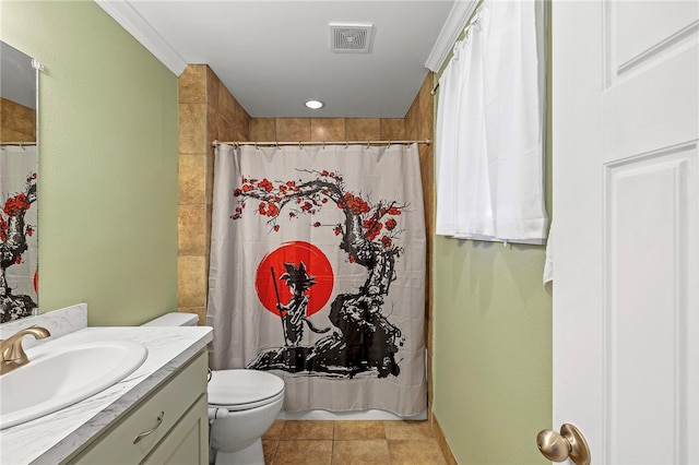 bathroom with vanity, tile patterned floors, walk in shower, crown molding, and toilet